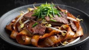 dark soy beef chow foon noodles